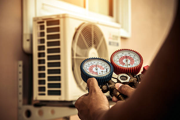 Professional Air Conditioning Service technician working in Pinehurst, NC